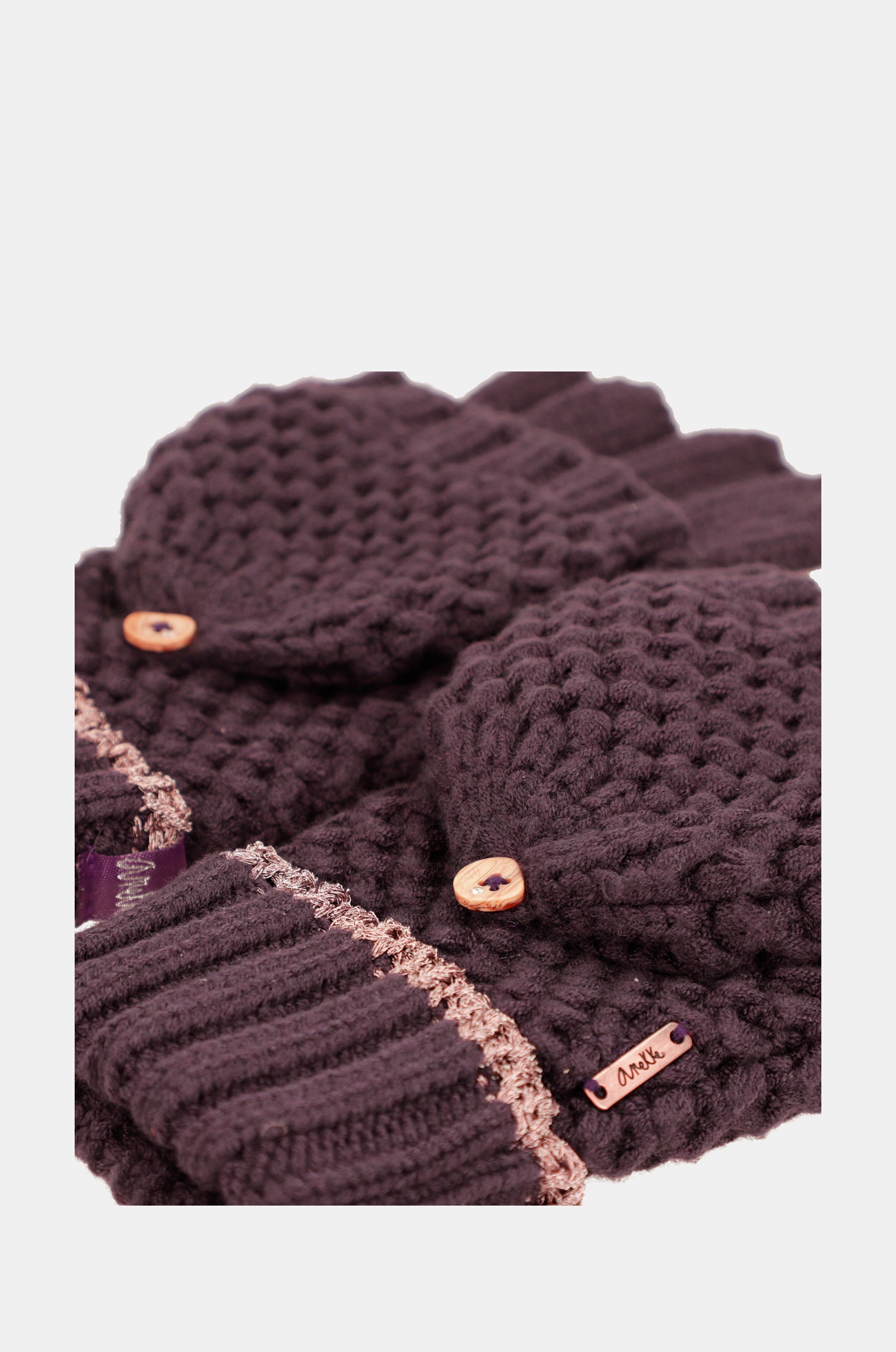 Purple knitted mittens