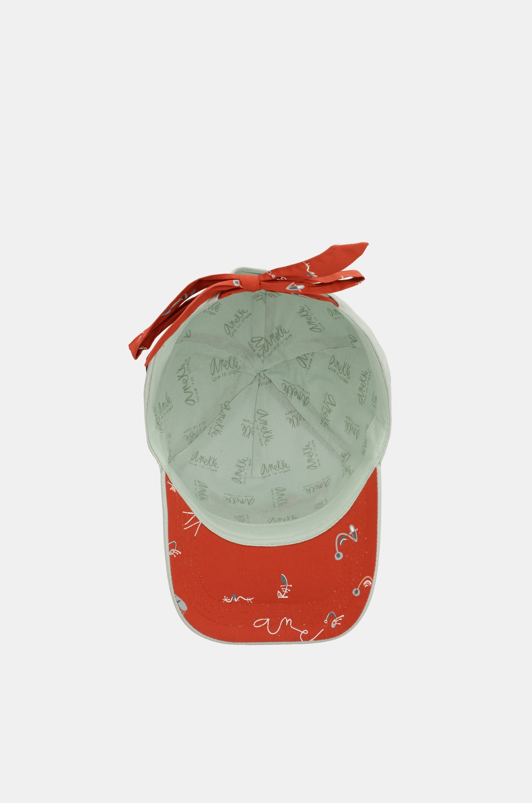 Green cap with red bow