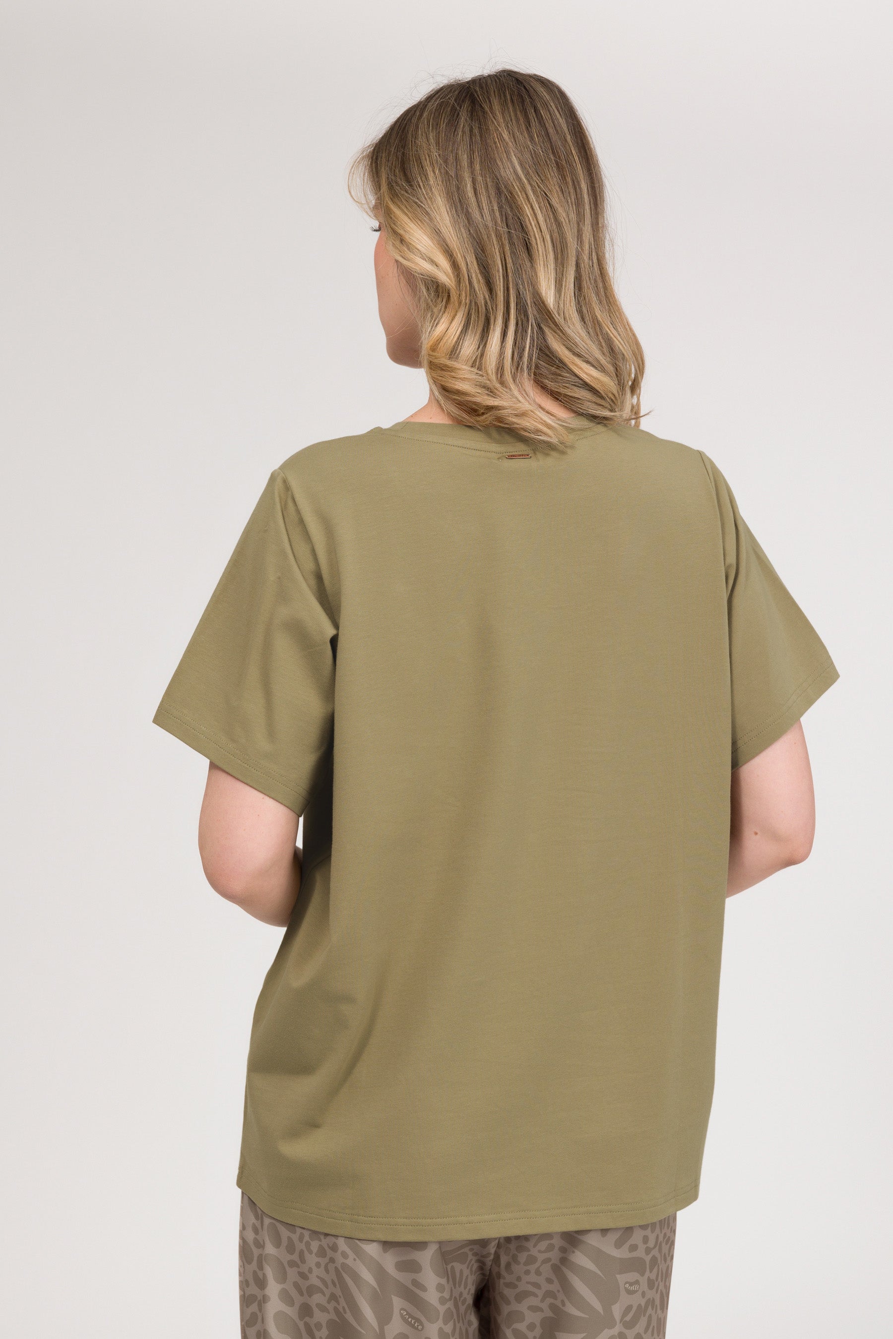 Green T-shirt with logo