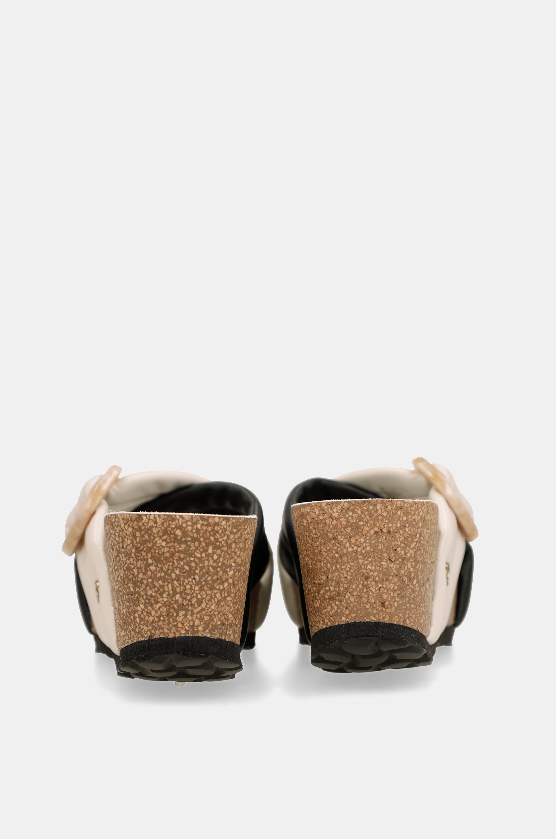 Black and white crossover sandals