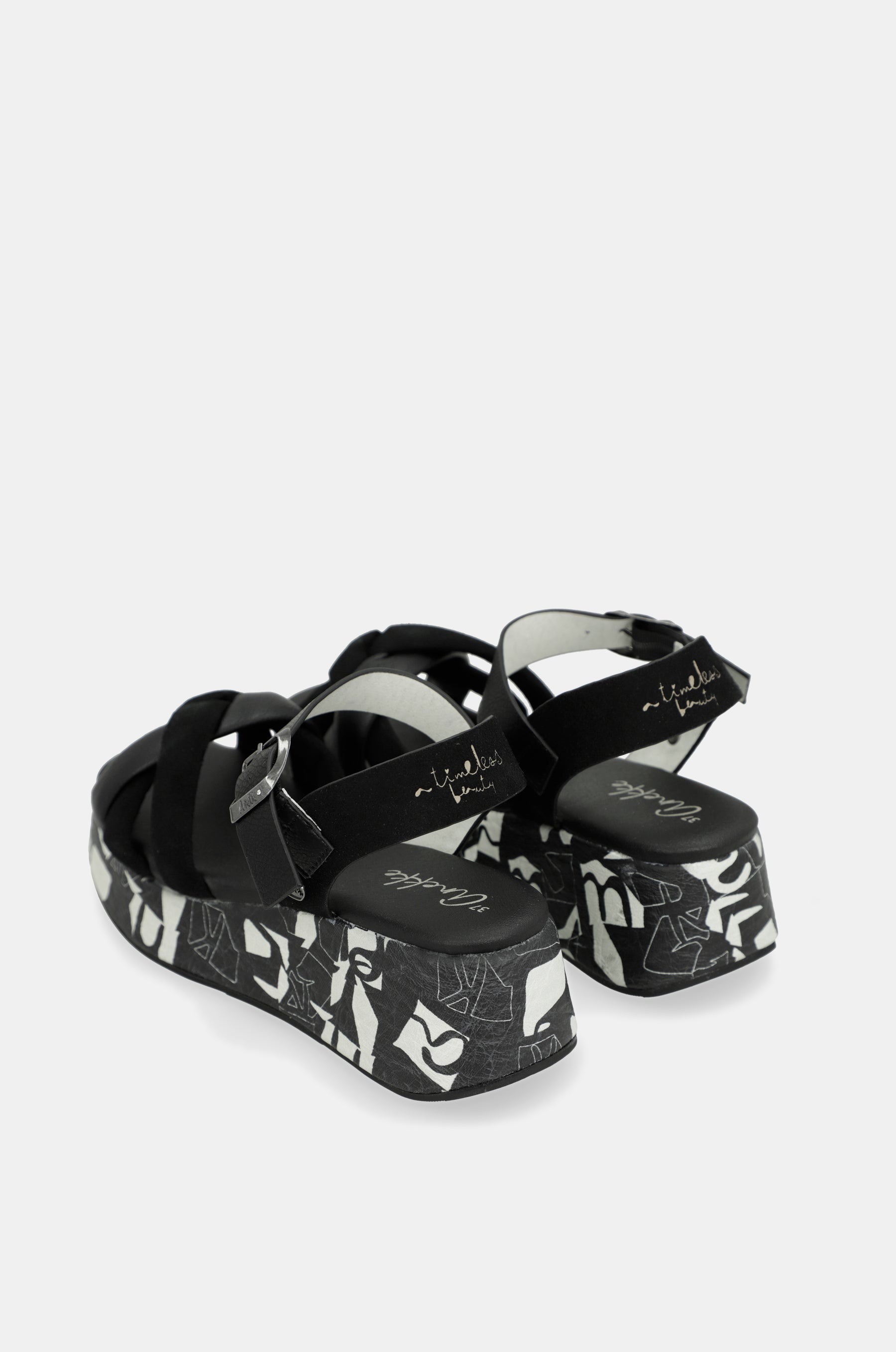 Black and white platform sandals