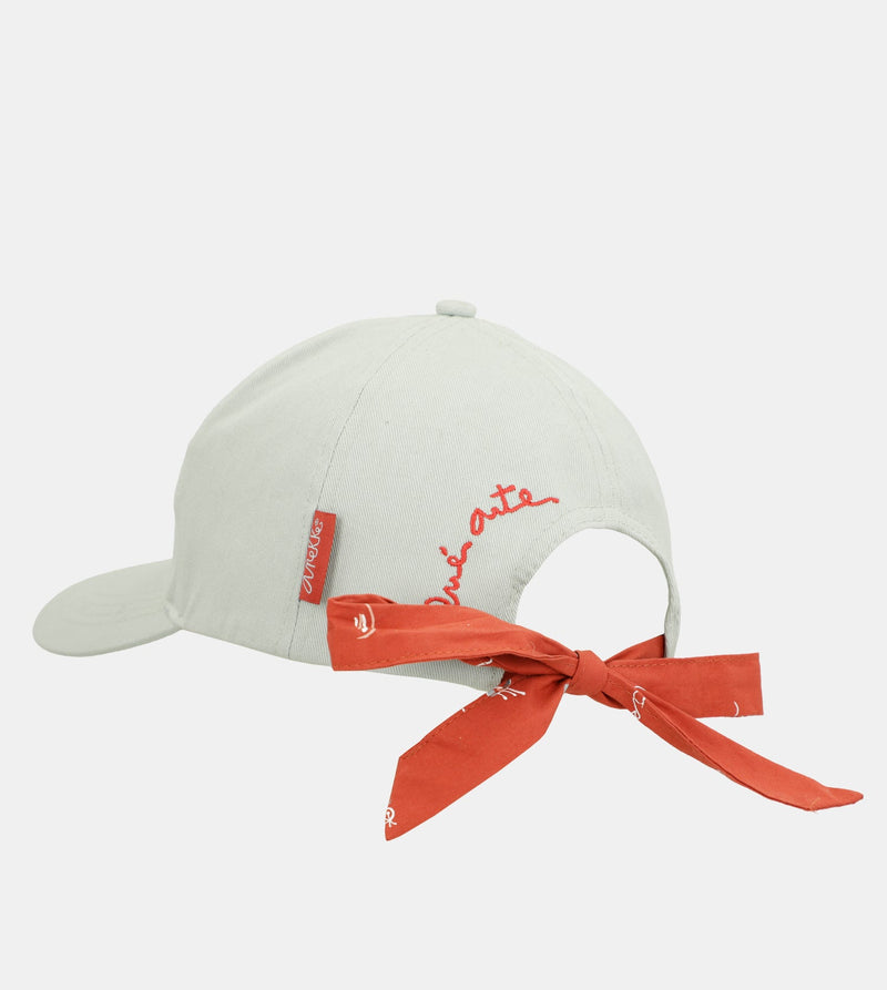 Green cap with red bow