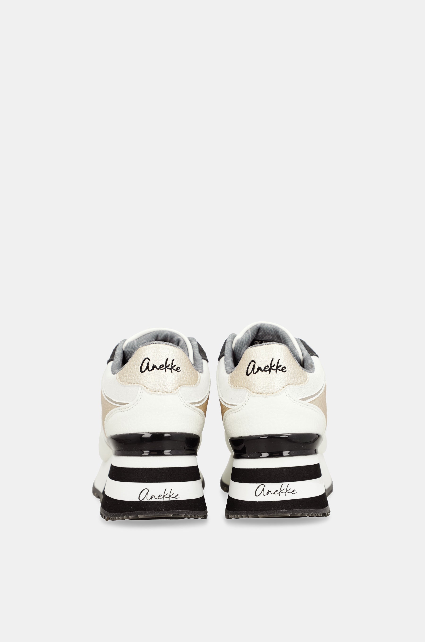 White sneakers with black details