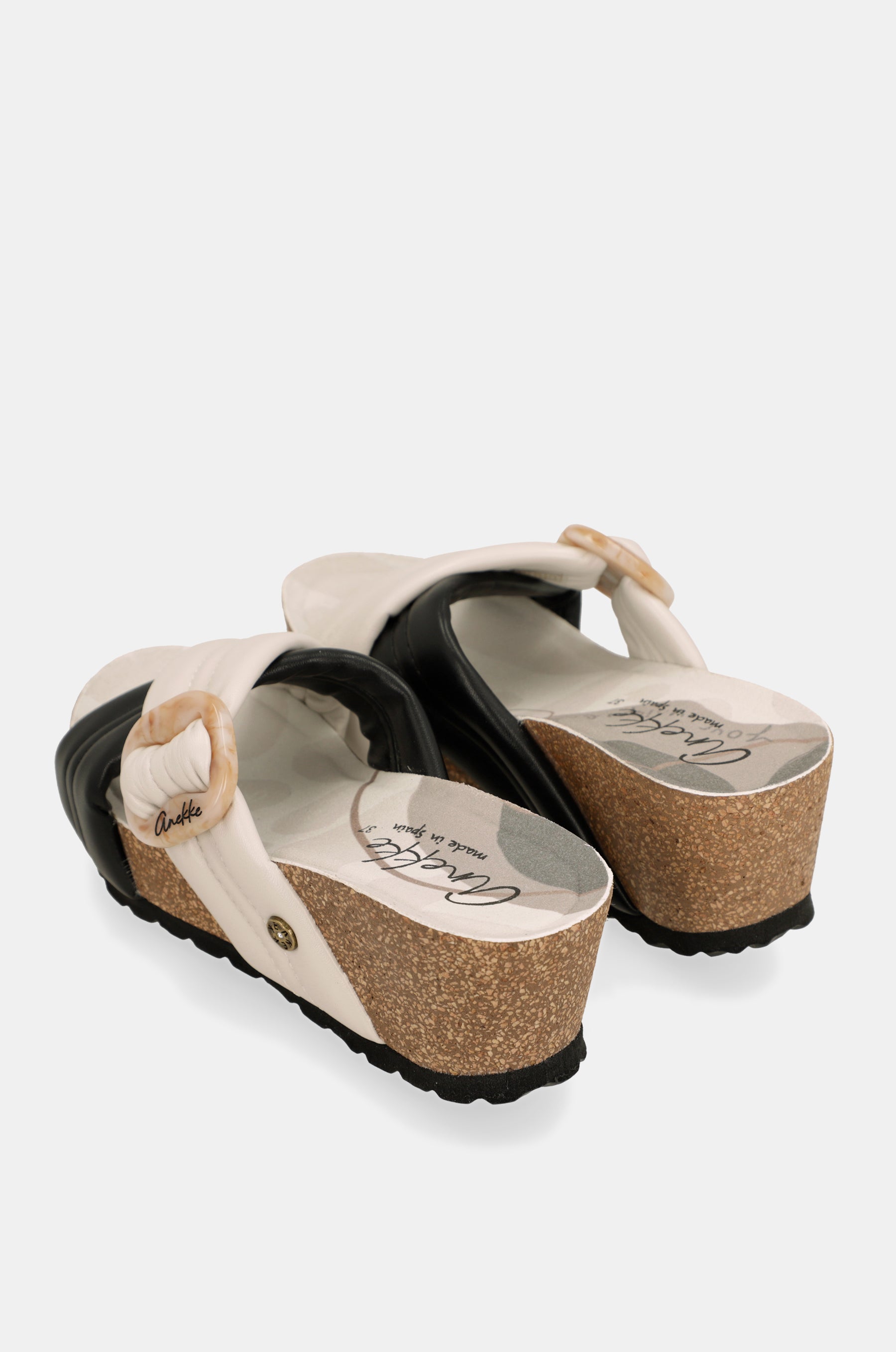 Black and white crossover sandals