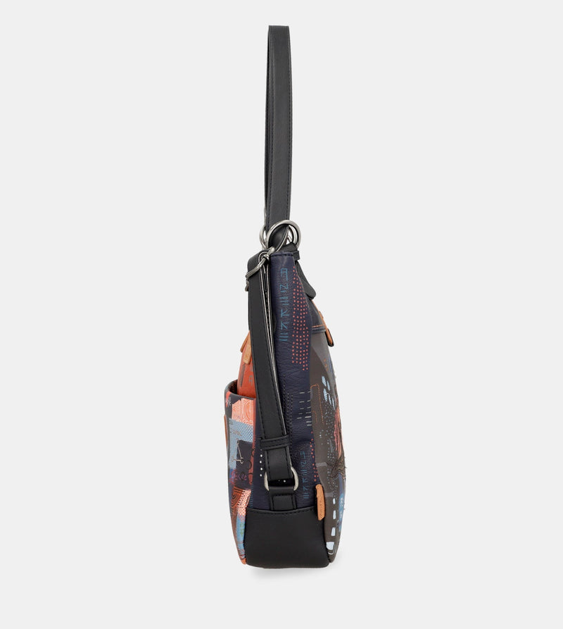 Contemporary shoulder bag convertible into a backpack Contemporary